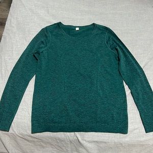 Dark green swiftly tech long sleeve shirt race length, size 6